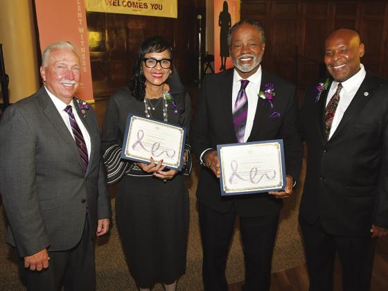 From left: Representative/Commissioner Thomas Burroughs; Karen Jones, honoree; Paul Jones, Friends of Yates Board member and KCK Mayor Tyrone Garner