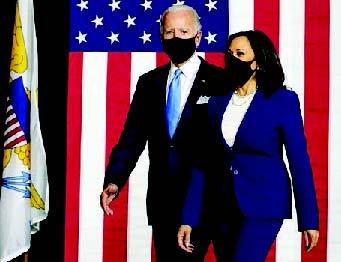 Democratic presidential candidate former Vice President Joe Biden and his running mate Sen. Kamala Harris, D-Calif., arrive to speak at a news conference at Alexis Dupont High School on Aug. 12, 2020. AP Photo