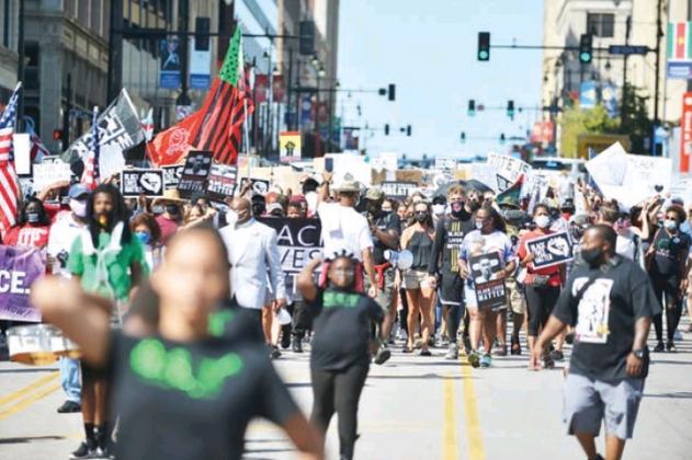 HUNDREDS ATTEND MARCH ON KC
