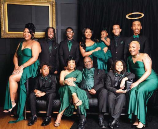 The late Cameron Lamb (back row, far right) is shown in this photo provided by the Lamb family (his image was photoshopped in).