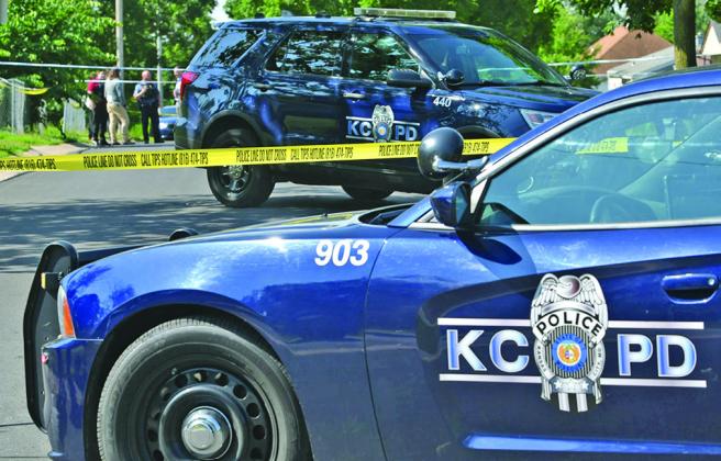 Kansas City police work the scene of a 2023 homicide on College Avenue near 74th Street (Carlos Moreno/KCUR 89.3)