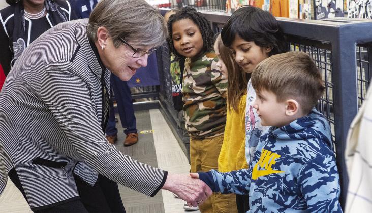 Kansas Gov. Laura Kelly sent a letter to the U.S. Department of Education requesting the administration of President Donald Trump reverse a decision to freeze $22.6 million allocated to the state for benefit of students and teachers. This is a 2023 image of Kelly meeting students at Jardine Elementary in Topeka. photo/Sherman Smith/Kansas Reflector. RELATED STORY INSIDE, P. B3