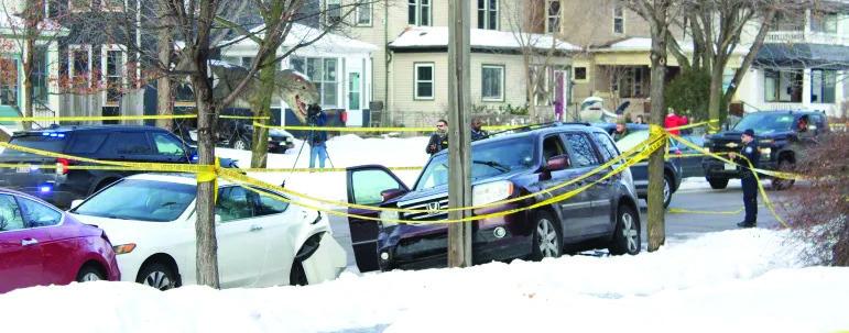 The purple SUV driven by Renee Macklin sits damaged at the intersection of 34th Street and Portland Avenue in south Minneapolis after she was shot by an ICE agent on Wednesday. Macklin later died from her injuries. State officials and witnesses said federal agents prevented a doctor at the scene from providing lifesaving CPR. (Courtesy Minnesota Spokesman-Recorder)