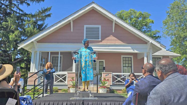 Jawana Jackson speaks to hundreds gathered at The Jackson Home at The Henry Ford for the grand opening of the home. (Michigan Chronicle)