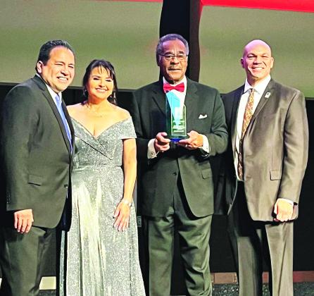 Hispanic Chamber of Commerce President/CEO Carlos Gomez presented the Community Impact Award to Congressman Cleaver (third from left) for his advocacy in Congress, including securing a $4 million earmark to expand the Chamber’s outreach in Kansas City.