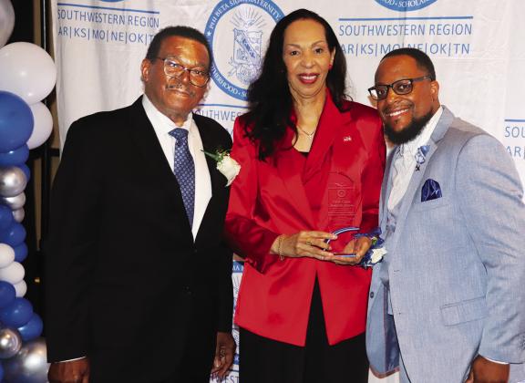 From left: Marion Jordon, Sr. and wife, Denise Jordon, owners of The Kansas City Globe newspaper receive the Business Award presented by Brandon Hill, Southwestern Regional Director of Phi Beta Sigma Fraternity. photo/George Barrett