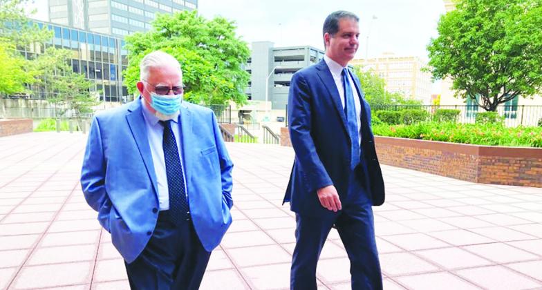 Roger Golubski, left, the former Kansas City, Kansas, Police Detective accused of sexual assault and other crimes, walks into the federal courthouse in Topeka with his attorney, Chris Joseph, in June 2023. Photo/Peggy Lowe, KCUR 89.3