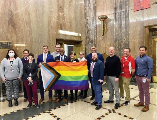 Pride flag raising ceremony at City Hall