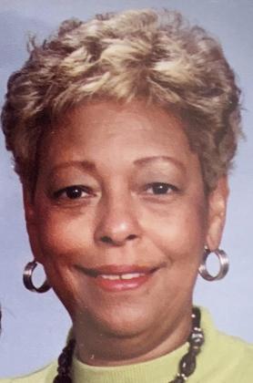 Verona M. Hughes Dies