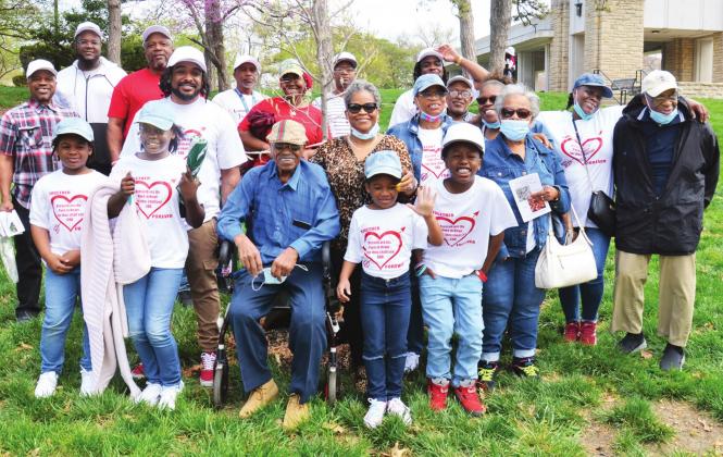 Above, members of the family of the late Harold and Mary Chaney stand near the Autumn Brilliance Serviceberry tree that was planted in their honor Saturday during the annual Arbor Day Tree Planting at at Loose Park in Kansas City, Mo. photo/Jesse Frazier, KC Parks &amp;amp; Recreation Department