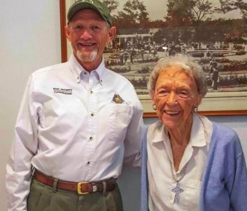 Conservation Commissioner Mark McHenry and Anita Gorman, Kansas City civic leader and former Missouri Conservation Commissioner, both have Arbor Day trees planted in their honor at Loose Park
