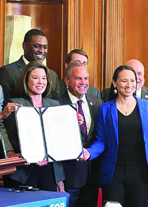 Rep. Sharice Davids at the signing of the bipartisan Respect for Marriage Act.