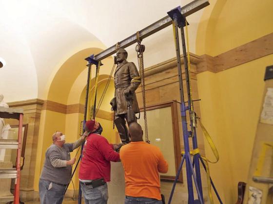 Statue of Robert E. Lee being removed from the U.S. Capitol in December 2020. (Photo: Jack Mayer/Office of Governor Northam)