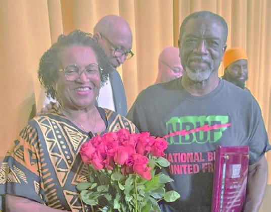 Sandra and Mickey Dean receiving awards from the National Black United Front - Kansas City for over 40 years of service to the organization.