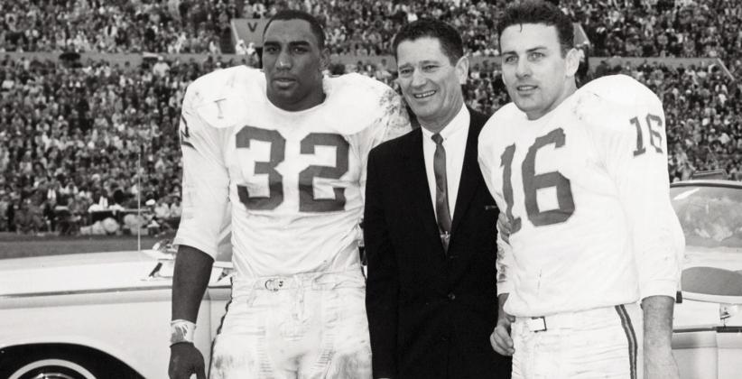 AFL Commissioner Joe Foss stands with Dallas Texans fullback Curtis McClinton (32) and Hall f Fame quarterback Len Dawson (16) following the AFL Championship Game, a 20-17 victory over the Houston Oilers on December 23, 1962. NFL/AP2009