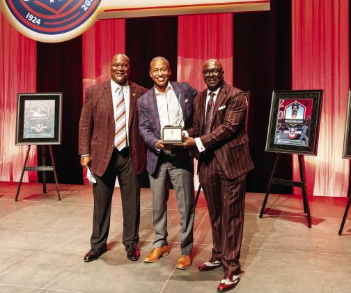 From left: NLBM Board Chairman Kevin Battle, Senior Financial Advisor, Merrill Lynch Wealth Management Vice President Kevin LeDuff, NLBM President Bob Kendrick