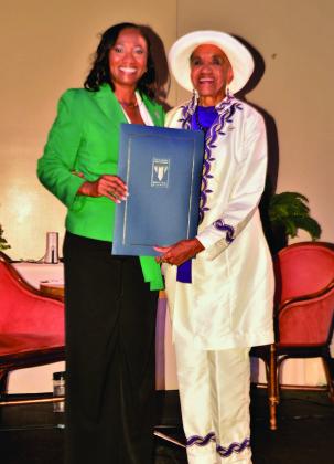 FIRST BLACK KCMO MAYOR PRO TEM HONORED WITH PROCLAMATION—Last Saturday at the Bruce R. Watkins Cultural Heritage Center’s “A Conversation with the Elders,” KCMO Fifth District Councilwoman and newly appointed Mayor Pro Tem Ryana Parks-Shaw (left), presented a Mayoral Proclamation to the first black woman Mayor Pro Tem and former Acting Mayor Joanne Collins. Parks-Shaw is the second black woman to be appointed Mayor Pro Tem in the city’s history. Photo/George Murphy