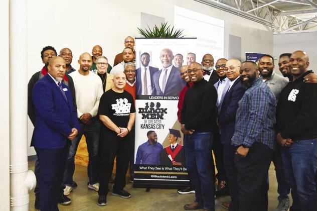 Shown above are some of the 100 Black Men members at the Dollars &amp;amp; Sense Program that trains high school students