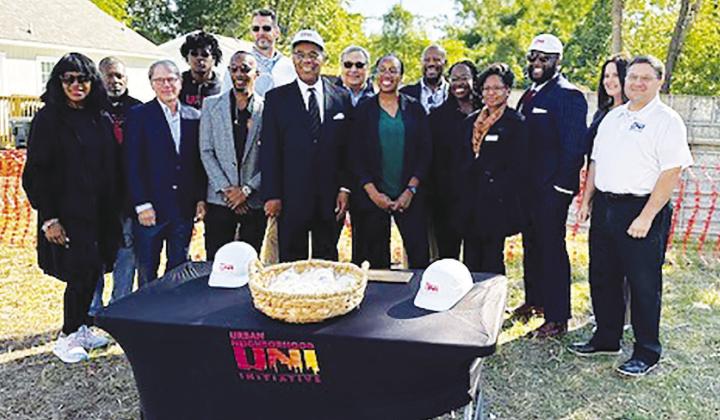 (Center) U.S. Representative Emanuel Cleaver, II (D-MO) on Monday joined Urban Neighborhood Initiative (UNI) leadership and community leaders to celebrate construction at the future site of nearly 100 affordable homes for families in underserved communities and present a check for $4 million in Community Project Funding the Congressman was able to secure. RELATED STORY ON PAGE 2.