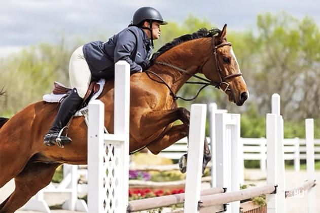 Sabrina and King Jumping 2’9” at Kansas Hunter Jumper Association’s Kingview in April 2023. photo/Haley Johnson