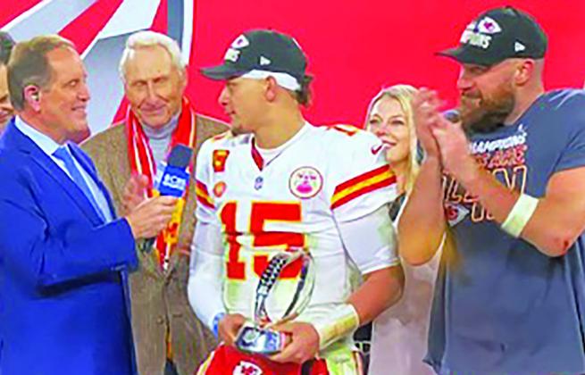 K.C. Chiefs QB Patrick Mahomes with the AFC trophy and Tight End Travis Kelce in a postgame interview following Sunday’s 17-10 win over the Ravens. screenshot photo