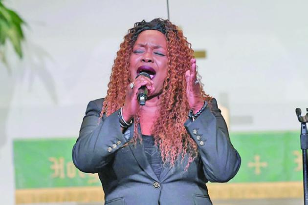 Rev. Alberta Walker, soloist