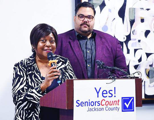 Legislators Donna Peyton and Jalen Anderson speaking at the signing ceremony.