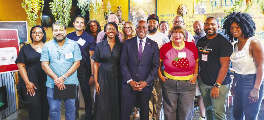 KCMO Mayor Quinton Lucas (center) with graduates of the 2025 DoorDash Accelerator for Locas Businesses in Kansas City.