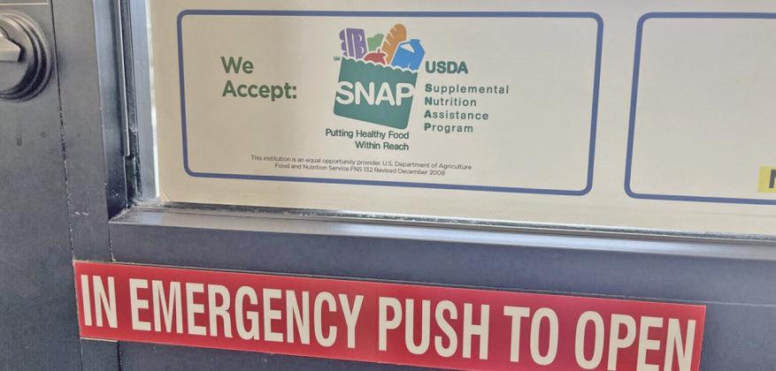 A sign advertises that SNAP benefits are accepted at a grocery store in Fargo, North Dakota, on July 7, 2026. (Photo by Ceilidh Kern for the North Dakota Monitor)
