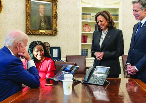 Joe Biden and Cherelle Griner speak on the phone with Brittney Griner after her release by Russia, as Vice-President Kamala Harris and the secretary of state, Antony Blinken, look on. Photo/ White House/Reuters