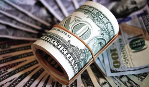 (Left photo): The Kansas Department of Revenue said state tax collections of $704 million in October exceeded expectations by 11% or $73 million. It was the 27th consecutive month state tax revenue surpassed the forecast. (Getty Images)