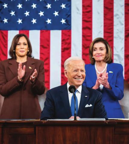 U.S. President Joe Biden on Tuesday, flanked by Vice President Kamala Harris (left) and House Speaker Nancy Pelosi (right) as he delivers his first State of the Union address. Courtesy photo