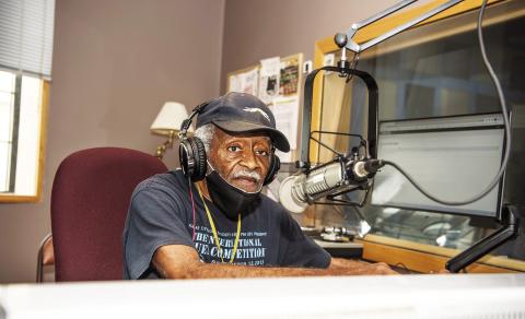 KKFI’s “Groovy” Grant Hopkins in the studio on May 10, 2023 for his final broadcast after telling his fans and listeners that failing health requires him to retire. photo/Raye Jackson