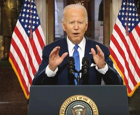 President Joe Biden speaks from Statuary Hall at the U.S. Capitol on Jan. 6, 2022, the one-year anniversary of the riot at the Capitol by supporters of former President Donald Trump,