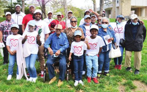 Above, members of the family of the late Harold and Mary Chaney stand near the Autumn Brilliance Serviceberry tree that was planted in their honor Saturday during the annual Arbor Day Tree Planting at at Loose Park in Kansas City, Mo. photo/Jesse Frazier, KC Parks &amp; Recreation Department