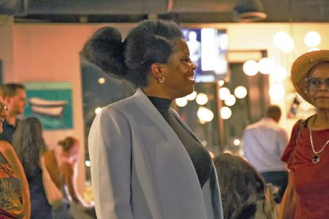 Stacy Lake celebrates victory in the Jackson County Executive Democratic primary at Cliff’s Taphouse in Kansas City on August 4, 2026. (Cassandra Isobelle Flores /KCUR 89.3)