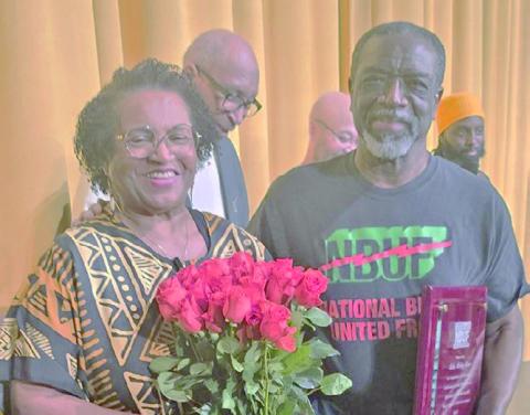 Sandra and Mickey Dean receiving awards from the National Black United Front - Kansas City for over 40 years of service to the organization.