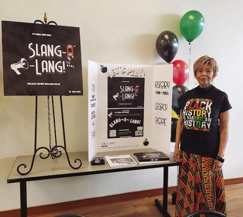 HISTORY IS AMERICAN HISTORY--Irene Carter, creator of the “Slang-A-Lang!” educational and culturally enriching game during the game’s “re-launch event” held Sunday at the Southeast Community Center in Kansas City, Mo. RELATED STORY ON PAGE 5