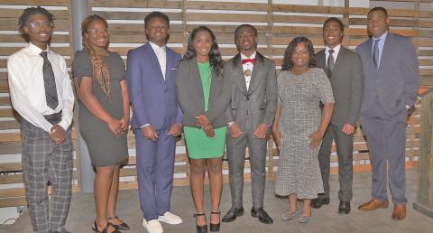 Beta Omega Chapter of the Omega Psi Phi Fraternity Inc. recently presented $1,000 awards to eight 'Distinguished Scholars.' Shown at the reception from left to right: Quentin King, Makayla McConnell, Kaleb Smith, Chloe Ervin, Christian Graham, Skylah Canady, Langston Humphrey, Davis Long.