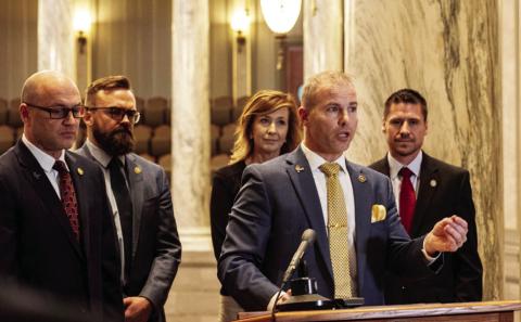 Sen. Rick Brattin, R-Harrisonville, speaking, and, from left, Sens. Denny Hoskins, Nick Schroer, Jill Carter and Andrew Koenig, members of the Freedom Caucus, during a Jan. 11 news conference (Annelise Hanshaw/Missouri Independent).