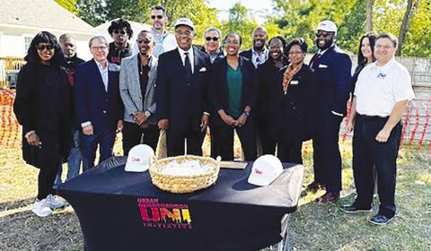 (Center) U.S. Representative Emanuel Cleaver, II (D-MO) on Monday joined Urban Neighborhood Initiative (UNI) leadership and community leaders to celebrate construction at the future site of nearly 100 affordable homes for families in underserved communities and present a check for $4 million in Community Project Funding the Congressman was able to secure. RELATED STORY ON PAGE 2.