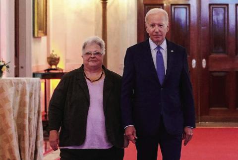 President Biden arrives with Susan Bro, mother of Charlottesville victim Heather Heyer, to deliver a keynote speech at the “United We Stand” summit to counter the effects of hate-fueled violence in the East Room of the White House on Thursday. MANDEL NGAN/AFP via Getty Images