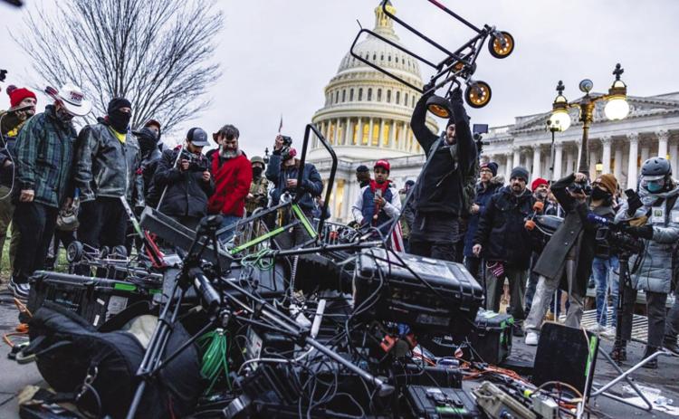 A mob of President Donald Trump’s supporters destroys multimedia equipment during the Jan. 6 attack on the U.S. Capitol photo/Alex Kent/Tennessee Lookout.
