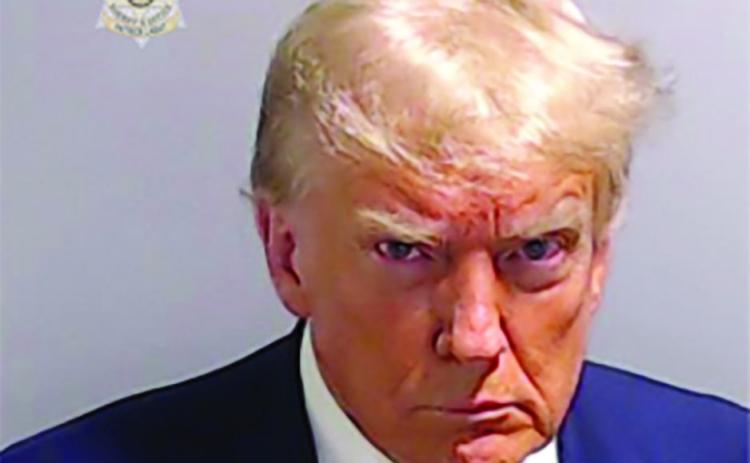 Trump, Allies Surrender in Election Interference Case