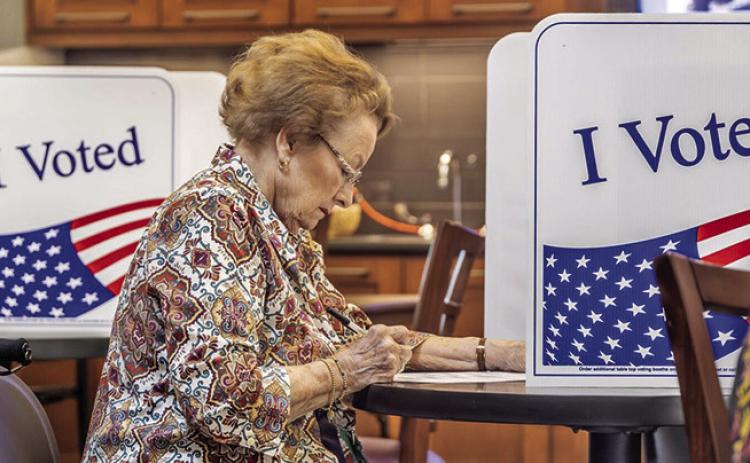 Elizabeth May marks her ballot while voting at Second Presbyterian Church in Little Rock’s Pleasant Valley neighborhood on Tuesday, March 3, 2026. (Photo by John Sykes/Arkansas Advocate)