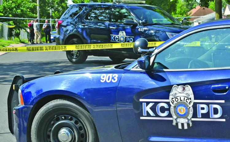 Kansas City police work the scene of a 2023 homicide on College Avenue near 74th Street (Carlos Moreno/KCUR 89.3)