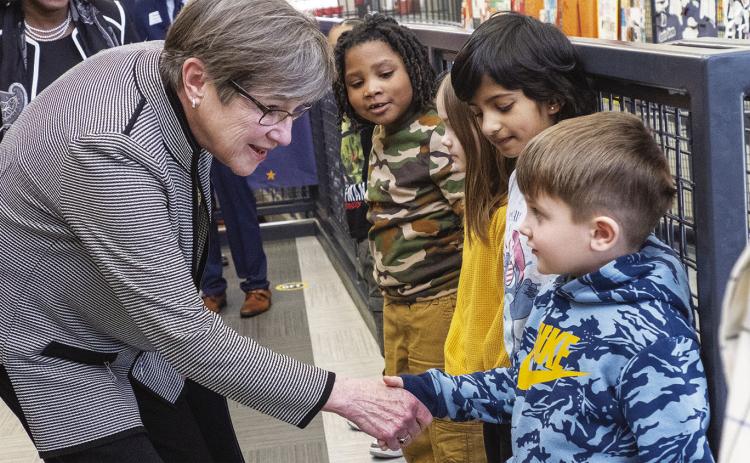 Kansas Gov. Laura Kelly sent a letter to the U.S. Department of Education requesting the administration of President Donald Trump reverse a decision to freeze $22.6 million allocated to the state for benefit of students and teachers. This is a 2023 image of Kelly meeting students at Jardine Elementary in Topeka. photo/Sherman Smith/Kansas Reflector. RELATED STORY INSIDE, P. B3
