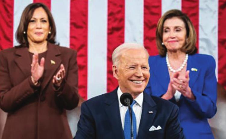 U.S. President Joe Biden on Tuesday, flanked by Vice President Kamala Harris (left) and House Speaker Nancy Pelosi (right) as he delivers his first State of the Union address. Courtesy photo