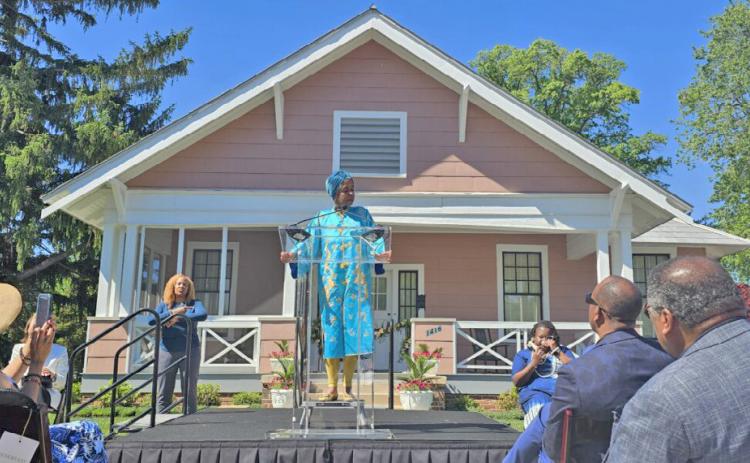 Jawana Jackson speaks to hundreds gathered at The Jackson Home at The Henry Ford for the grand opening of the home. (Michigan Chronicle)