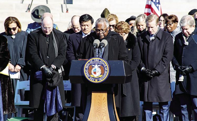 The Reverend John Modest Miles, senior pastor of Morning Star Missionary Baptist Church in KansasCity, Mo. delivers the benediction following Monday’s ceremony at the Missouri Capitol.